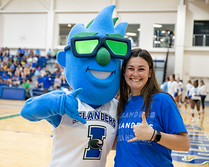 student with a school mascot